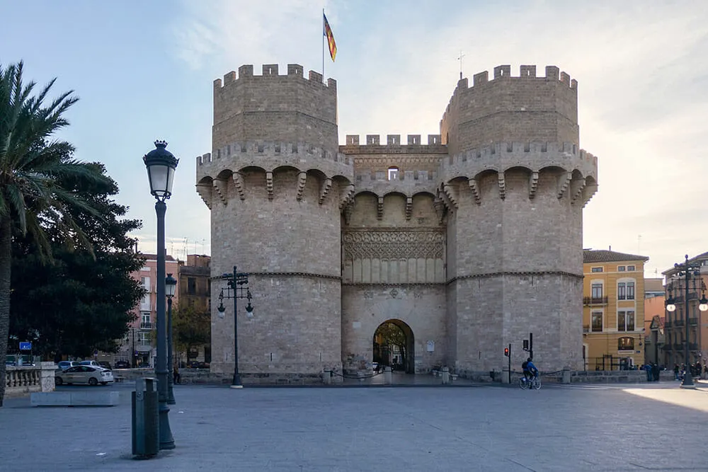 Medieval Serranos Towers with arch gate in Valencia - Colourful buildings with balconies in the neighbourhood of Russafa in Valencia - Things to do in Valencia, Spain