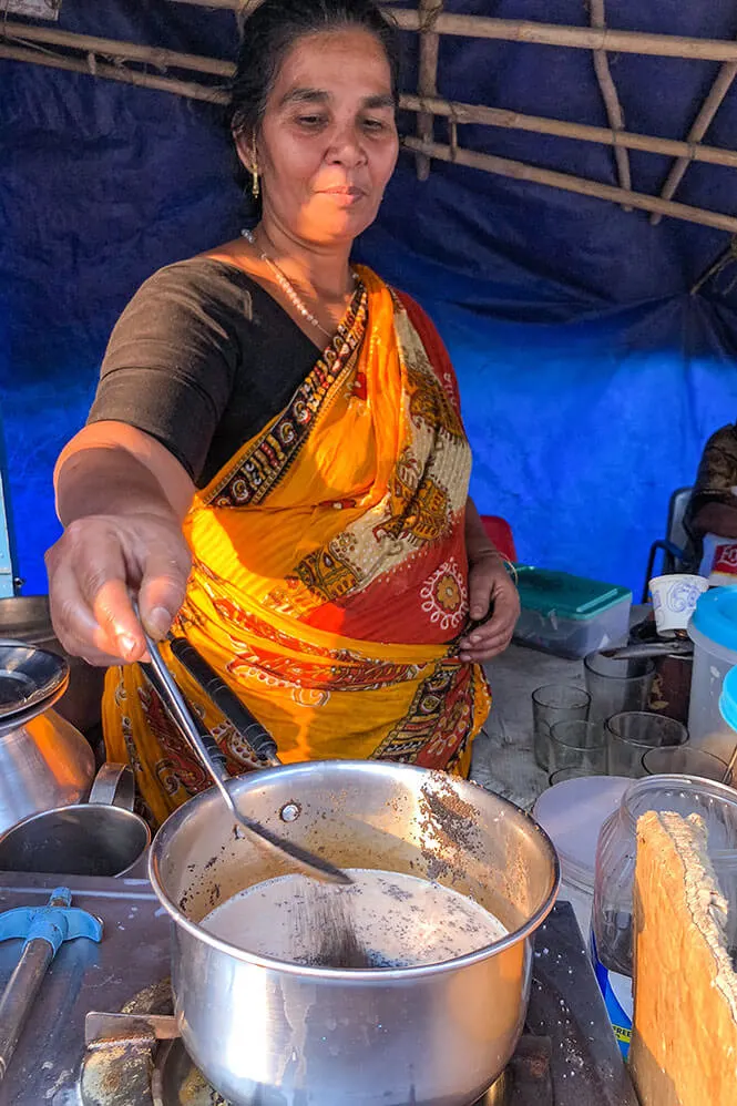 Lady making masala chai at a roadside chai stall in Munnar, Kerala - #munnar #kerala #india