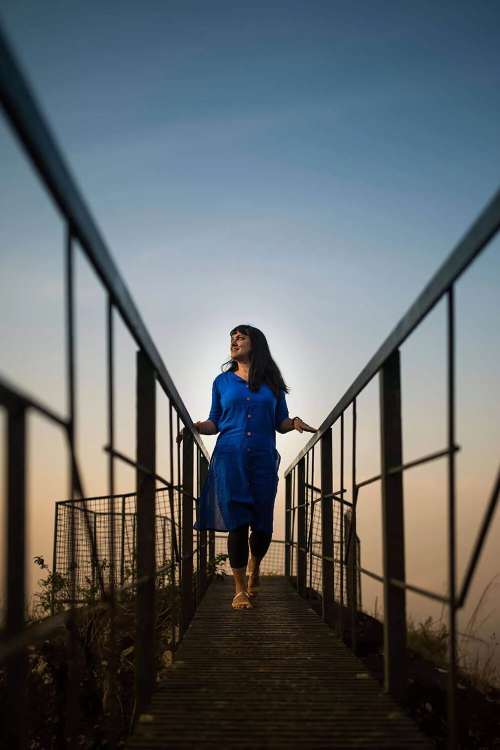 Portrait on a bridge on top of a mountain in Munnar during sunrise - #munnar #kerala #india