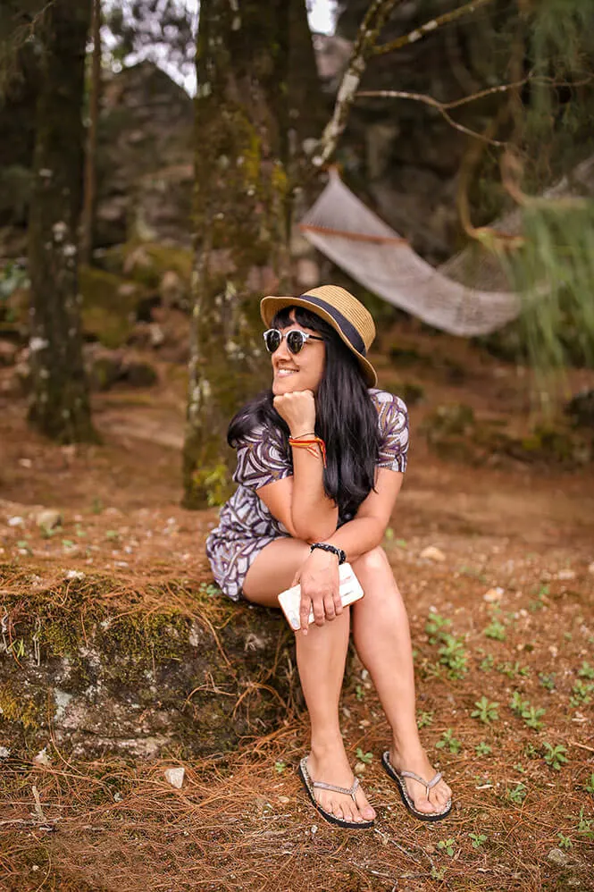 Portrait sitting on a rock on a wooded area of Windermere Estate in Munnar - #munnar #kerala #india