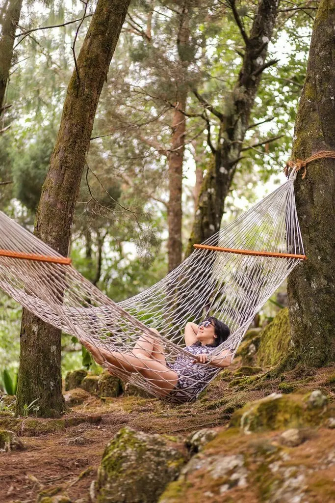 Lying on a hammock in a wooded area in Windermere Estate in Munnar - #munnar #kerala #india