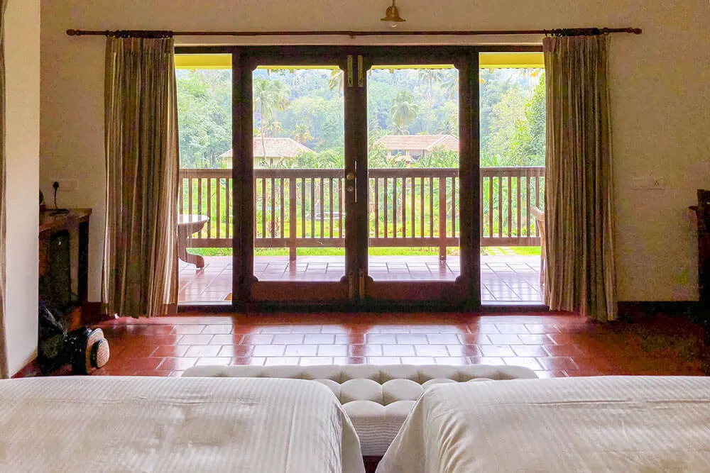 View of banana and palm trees form room at Windermere River House in Neriamangalam - #kerala #india