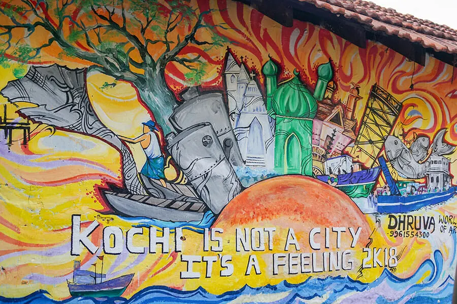 Street art mural reading Kochi is not a city, it's a feeling
