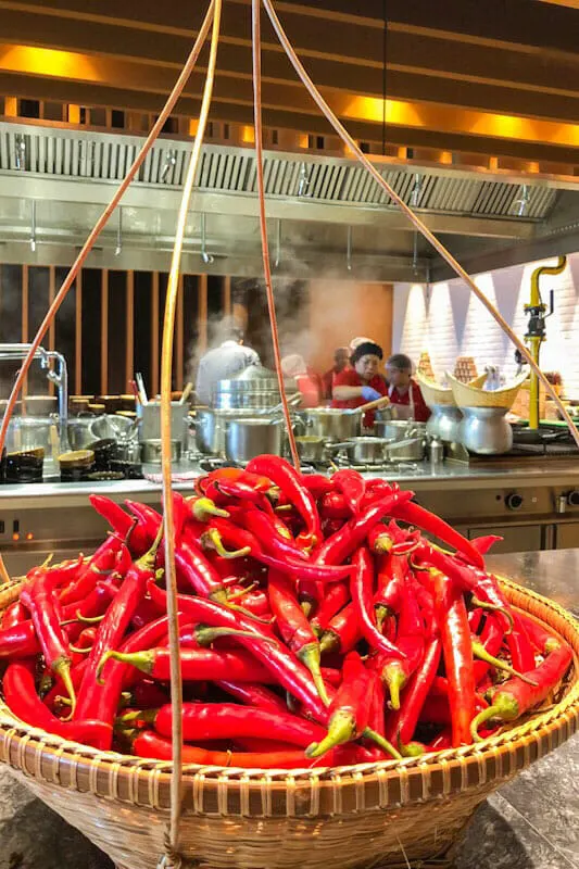 Basket with red chillies in the kitchen of the Thai Soul Restaurant at the Grand Hyatt Kochi Bolgatty Hotel