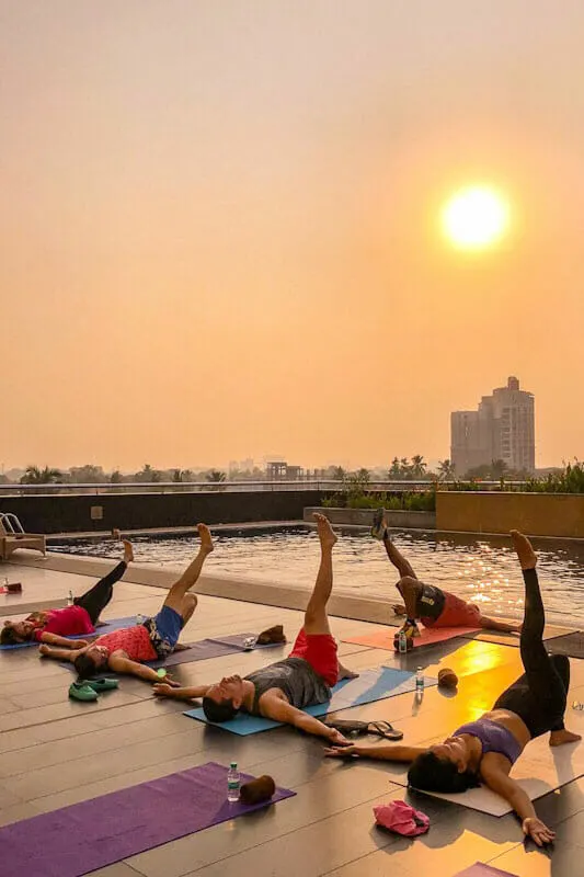 Sunrise yoga by the pool at the Kochi Marriott Hotel