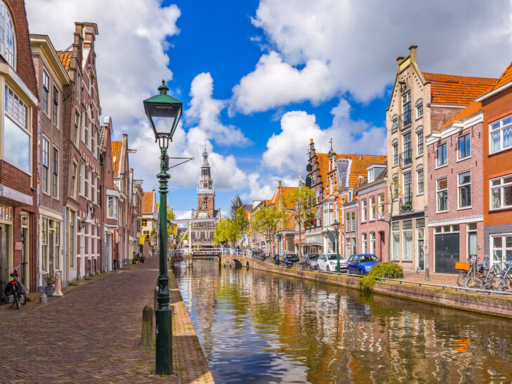 Canal with typical Dutch houses on both sides. Alkmaar is one of the most beautiful cities in the Netherlands