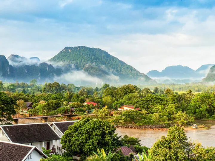 View of Vang Vieng with the river and the mountains in the background