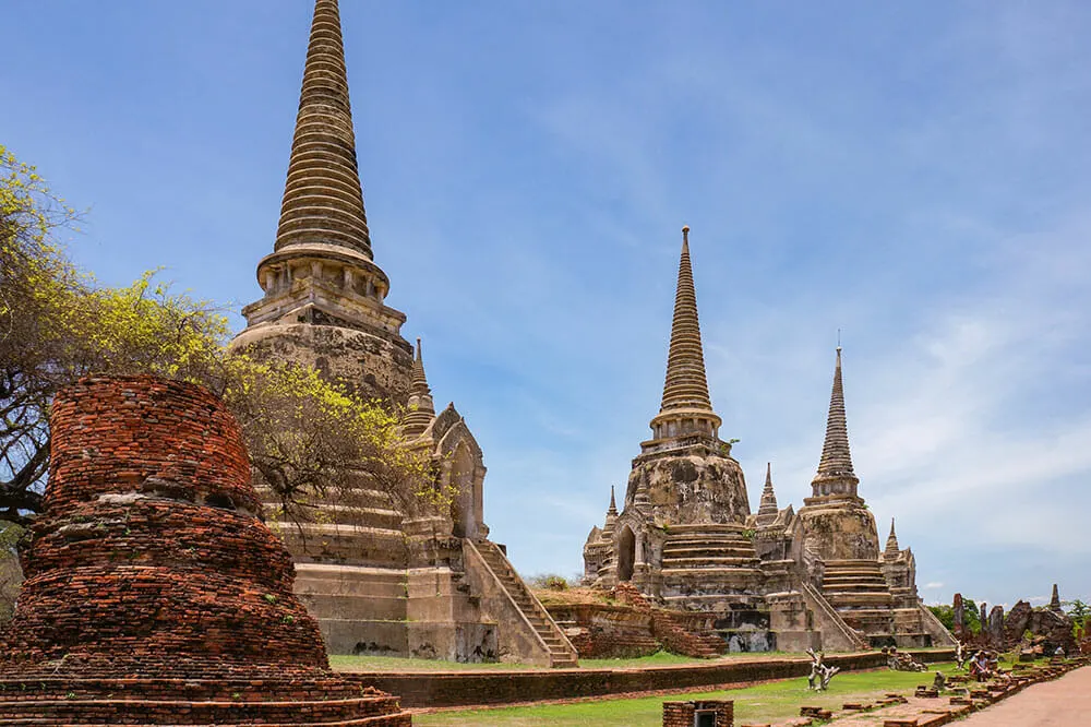 The ancient chedis of Wat Phra Si Sanphet, a highlight of the Ayutthaya stop on this 10 day Thailand tour